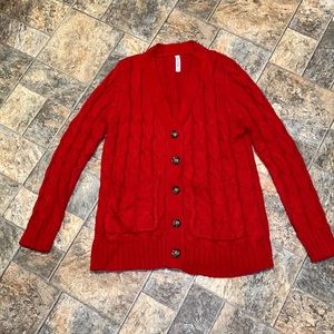 Plus size 2X knit sweater. Functioning button with pockets. Very soft and warm.